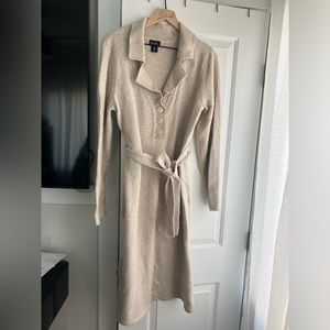 Bone color, long sleeve, maxi sweater dress. Collar with buttons and belt.
